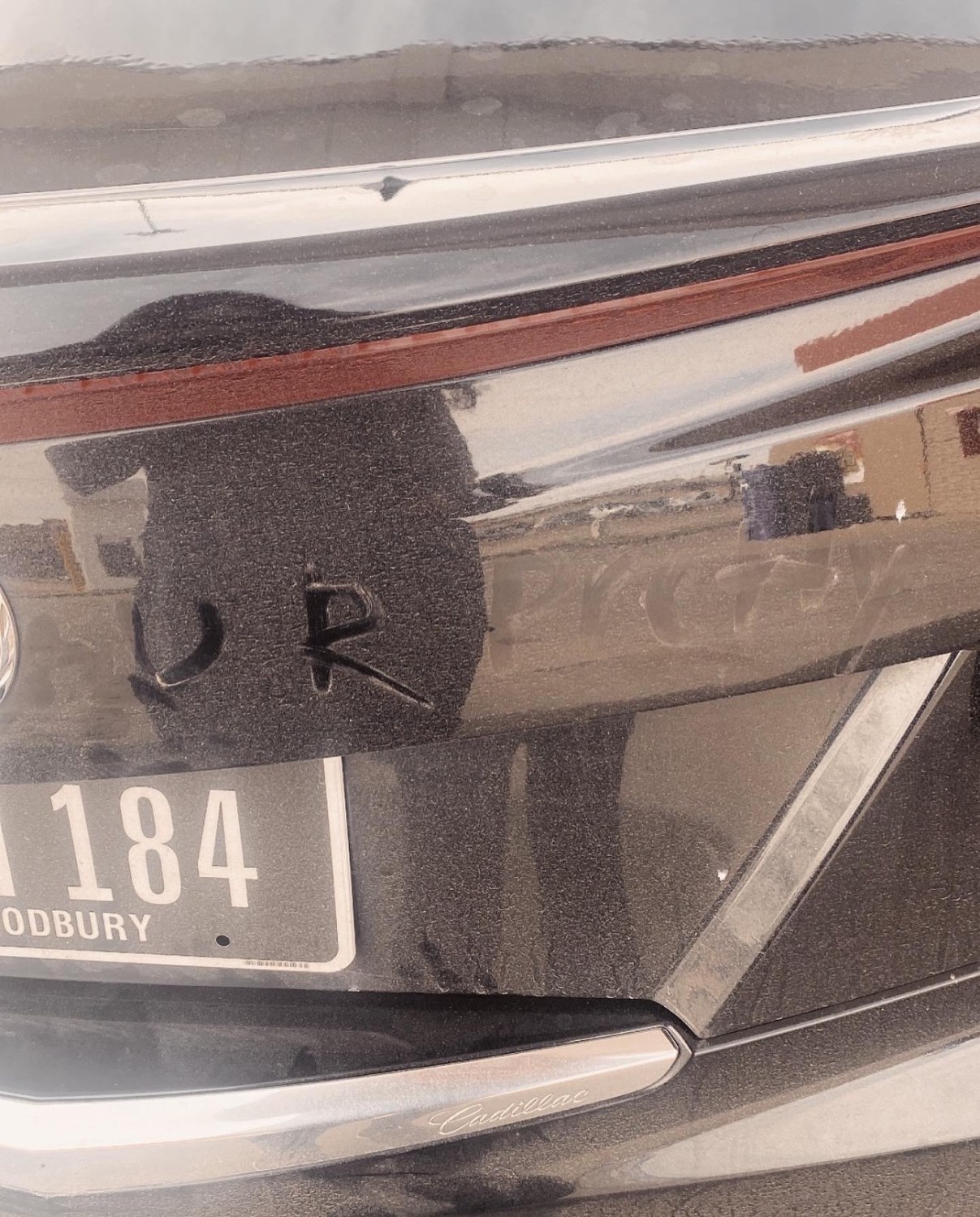 You are pretty drawn on back of dirty car 