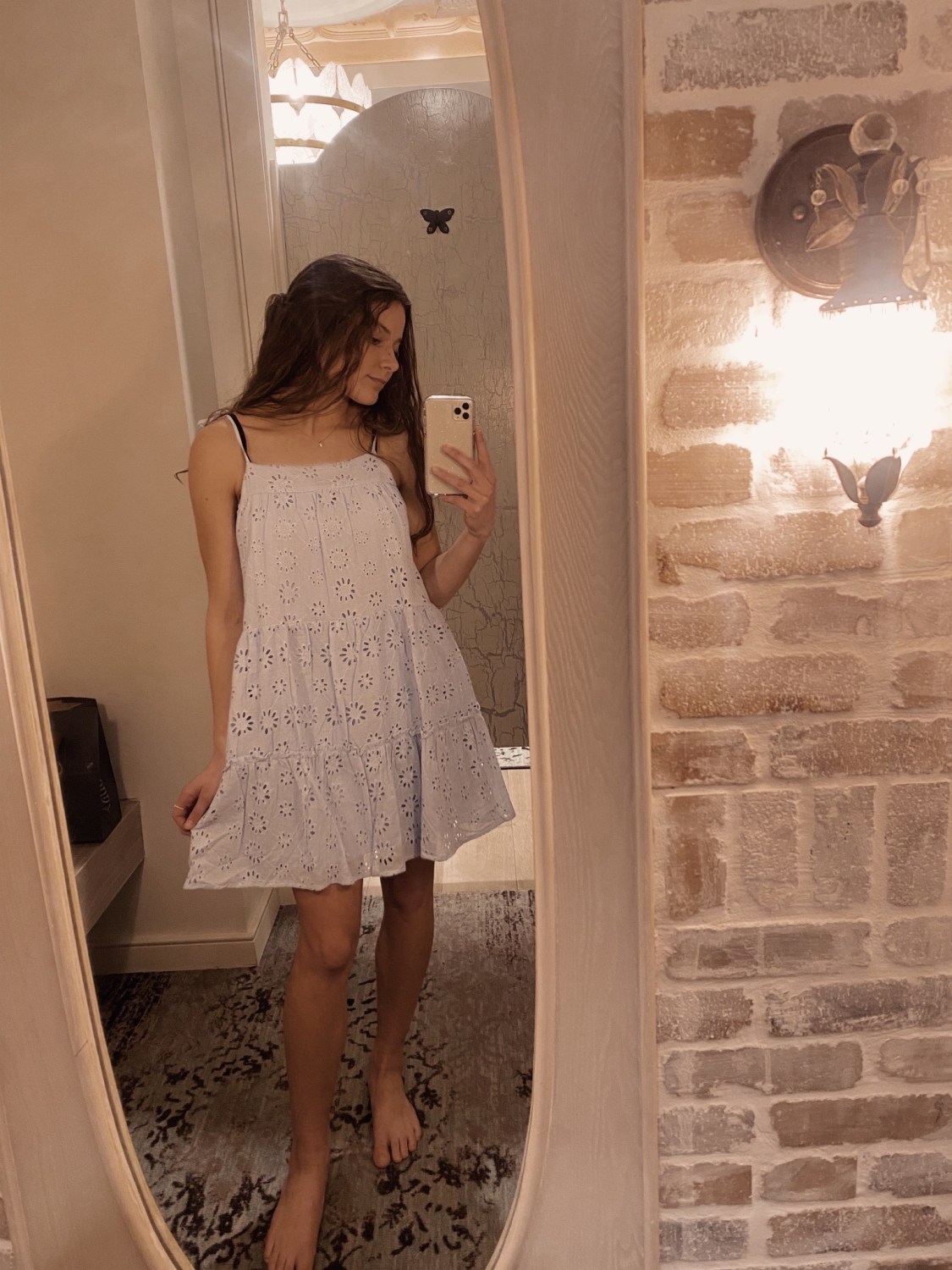 Trying on dresses mirror selfie 