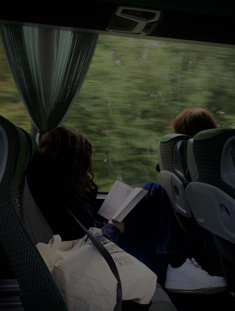 Girl reading in bus